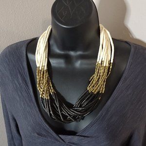 23.5 Inch Layered Off White, Gold Tone, And Black Bead Necklace